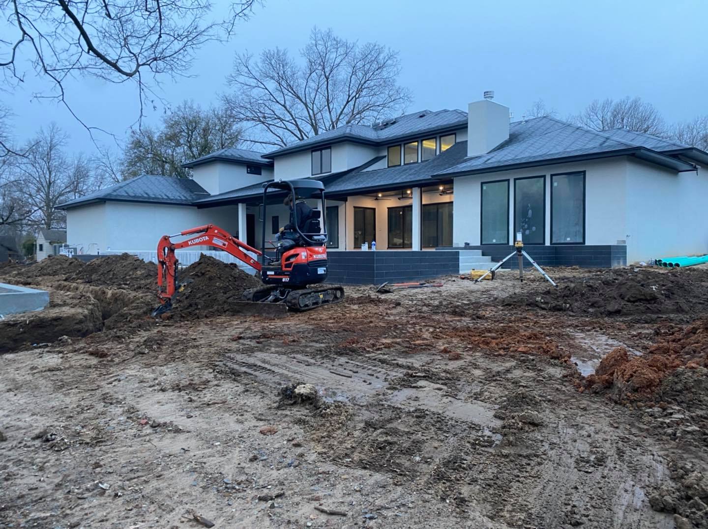 J&S Contracting excavator completing groundwork at a Tulsa-area home